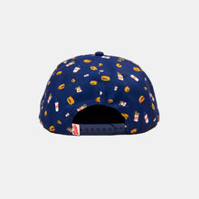 Load image into Gallery viewer, Back view navy blue hat with all over burger, fry, and shake pattern with navy plastic snapback and red DDIR &quot;Dick&#39;s&quot; tag
