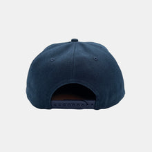 Load image into Gallery viewer, Back view navy blue hat with navy plastic snapback closure