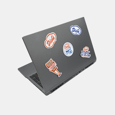Laptop with 5 miscellaneous blue, orange and brown Dick's Drive-In stickers on front