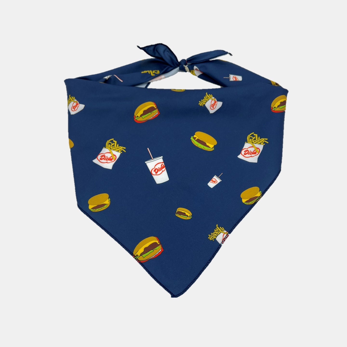 Navy blue pet bandana with all over burger, fry, and milkshake pattern
