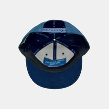 Load image into Gallery viewer, Inside view navy snapback hat with hidden pocket in cap. &quot;A Seattle Legend Since 1954&quot; in light blue on pocket
