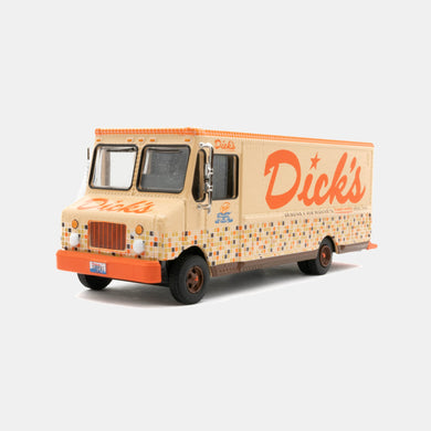Left side view toy Dick's Drive-In Food Truck. Tan with brown and orange tiles on bottom and 