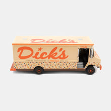 Load image into Gallery viewer, Right side view toy Dick&#39;s Drive-In Food Truck. Tan with brown and orange tiles on bottom and &quot;Dick&#39;s&quot;script on side
